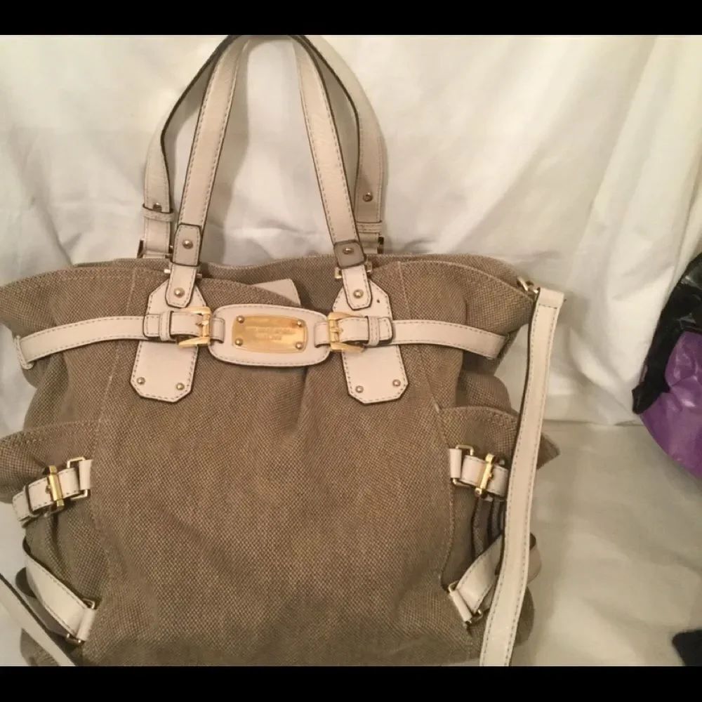 Michael Kors Canvas Leather Drawstring Bag heavy